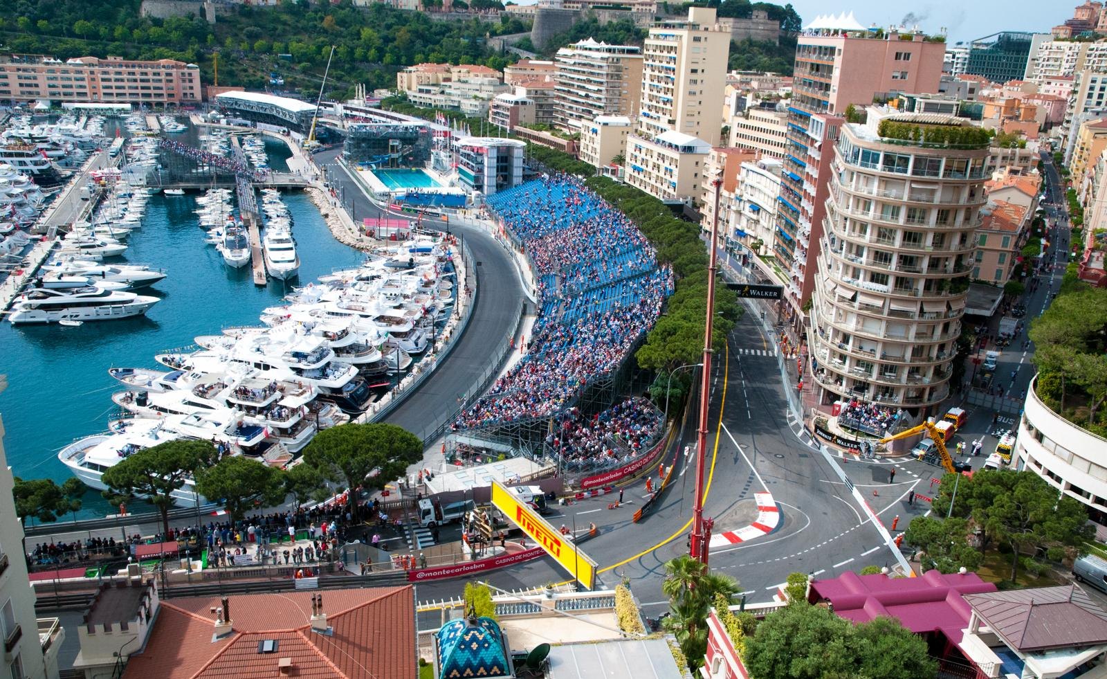 Race day from the terrace: the grandstands full, Sainte-Dévote below